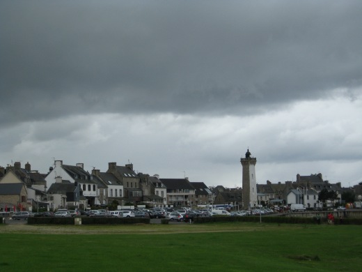 Lighthouse and town of Roscoff, France.
